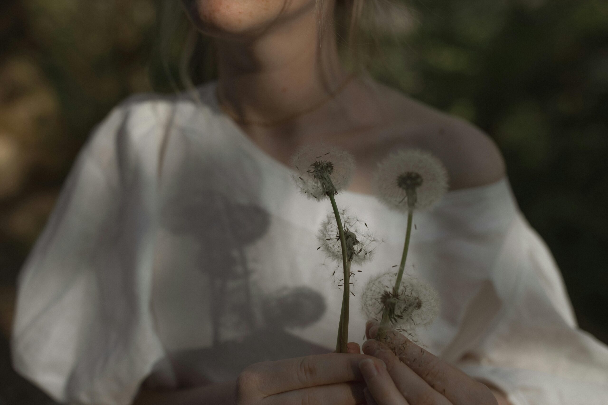 Woman holding daffodils